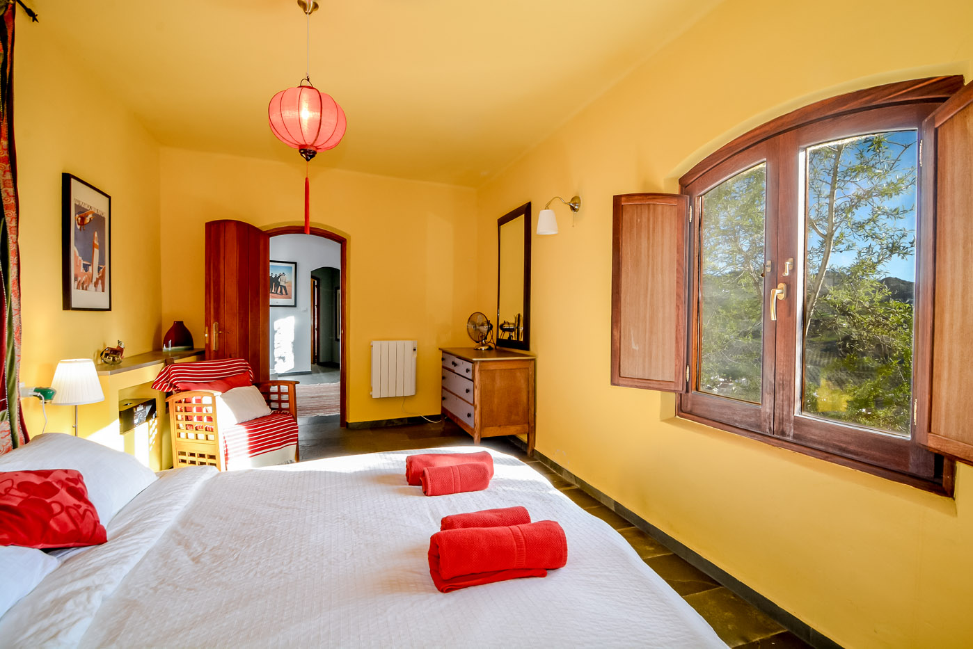 Master bedroom with double bed and walk in wardrobe