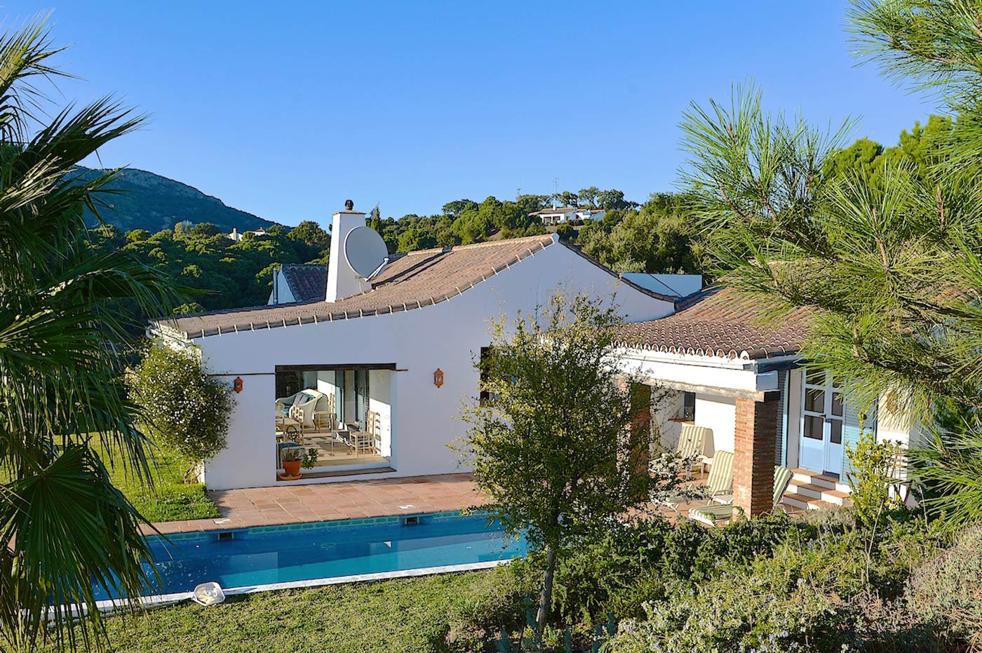 The annexe on the right connects internally with the villa