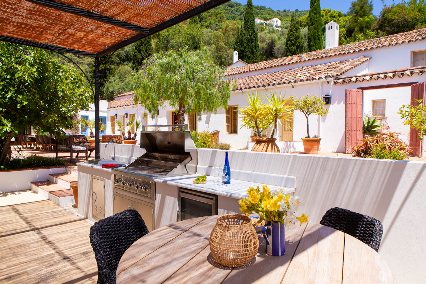 The outdoor kitchen is shaded