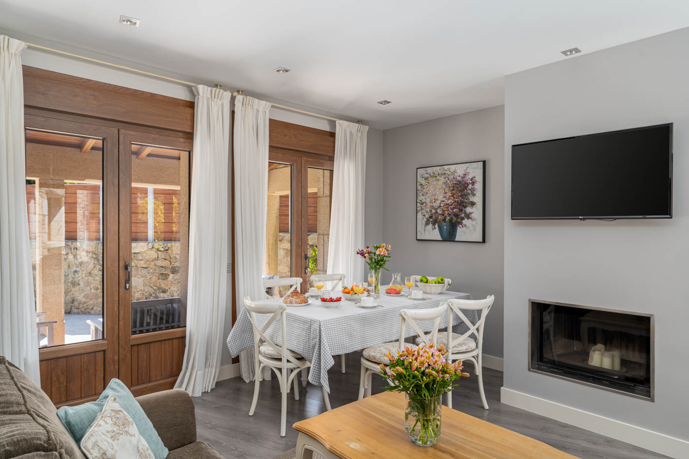 Indoor dining facilities with glass fronted fireplace