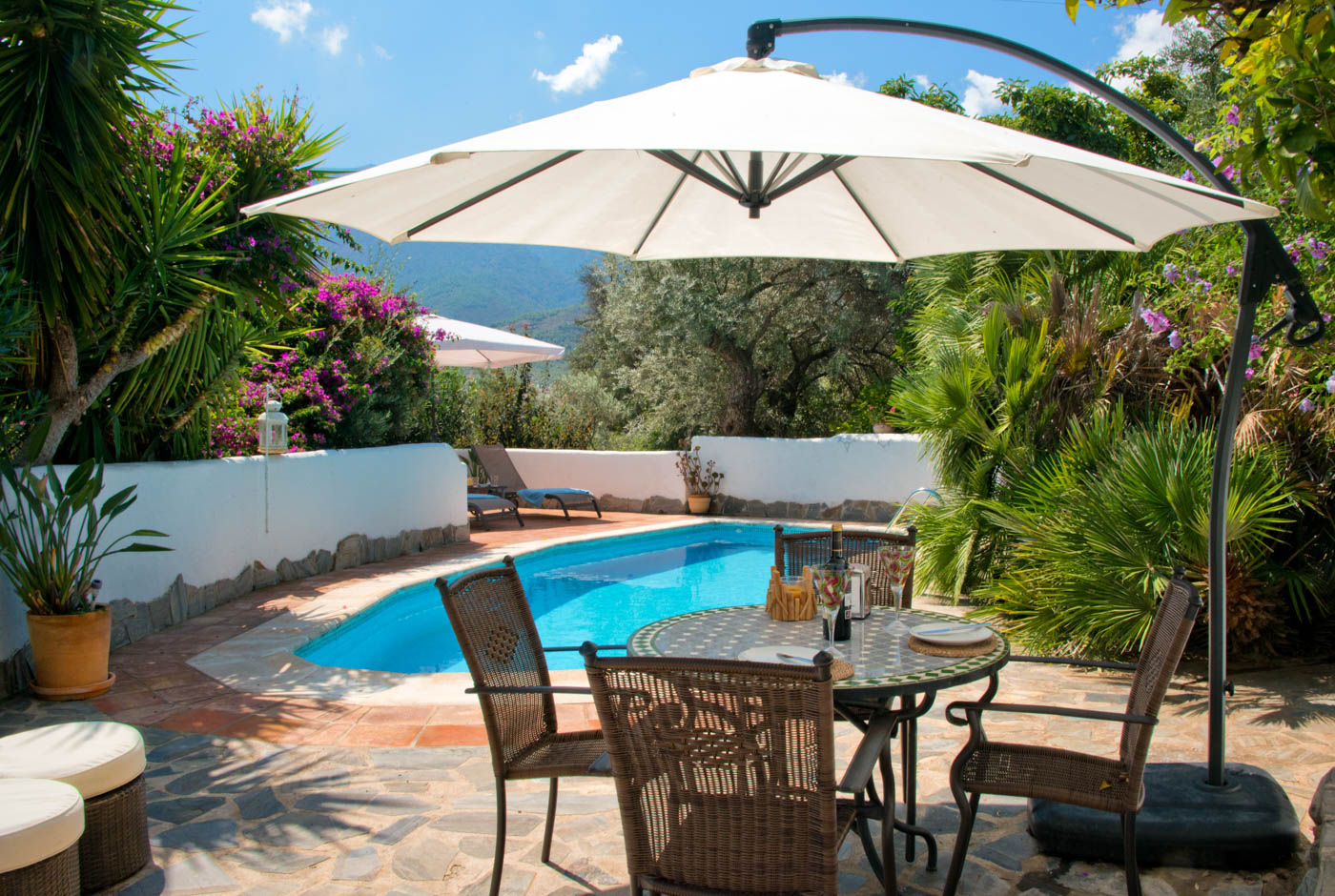 Seating area by swimming pool