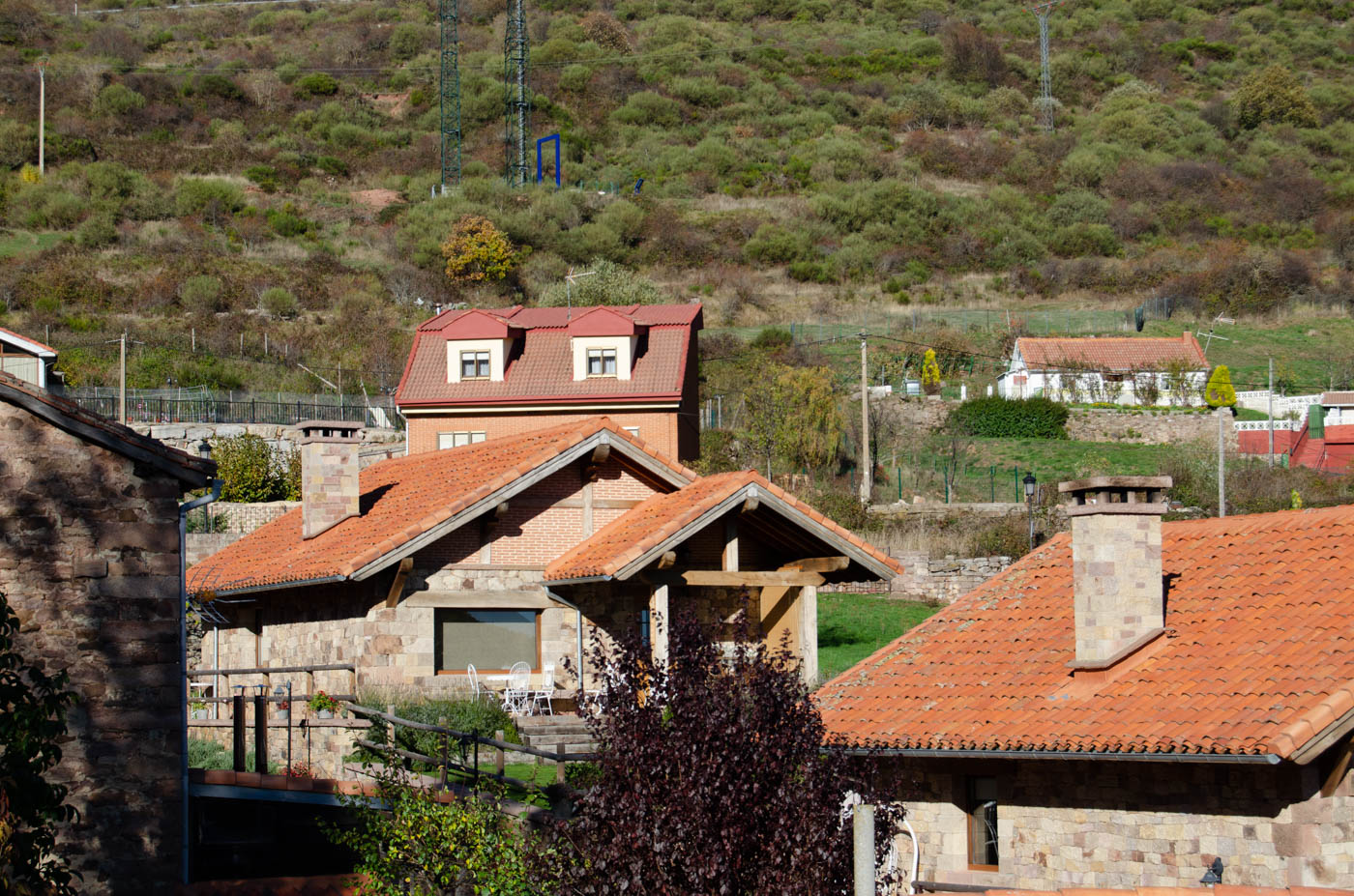 Twin villas in private estate on village borders