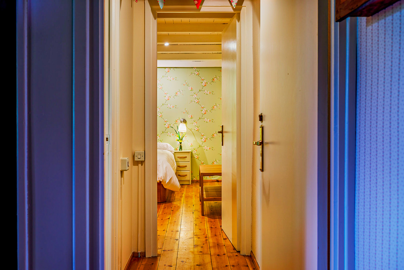 Doors to bedroom 2 and private bathroom