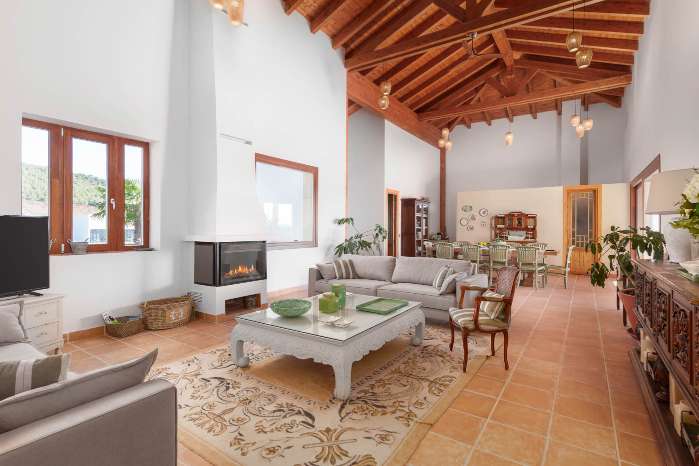 Open plan living / dining area with kitchen at far end