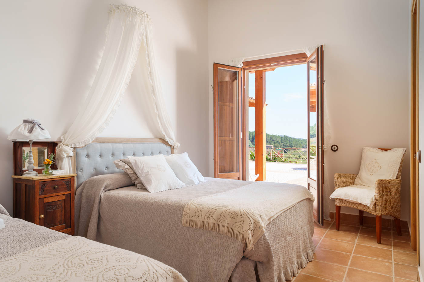 Bedroom 2, also with direct access to terraces