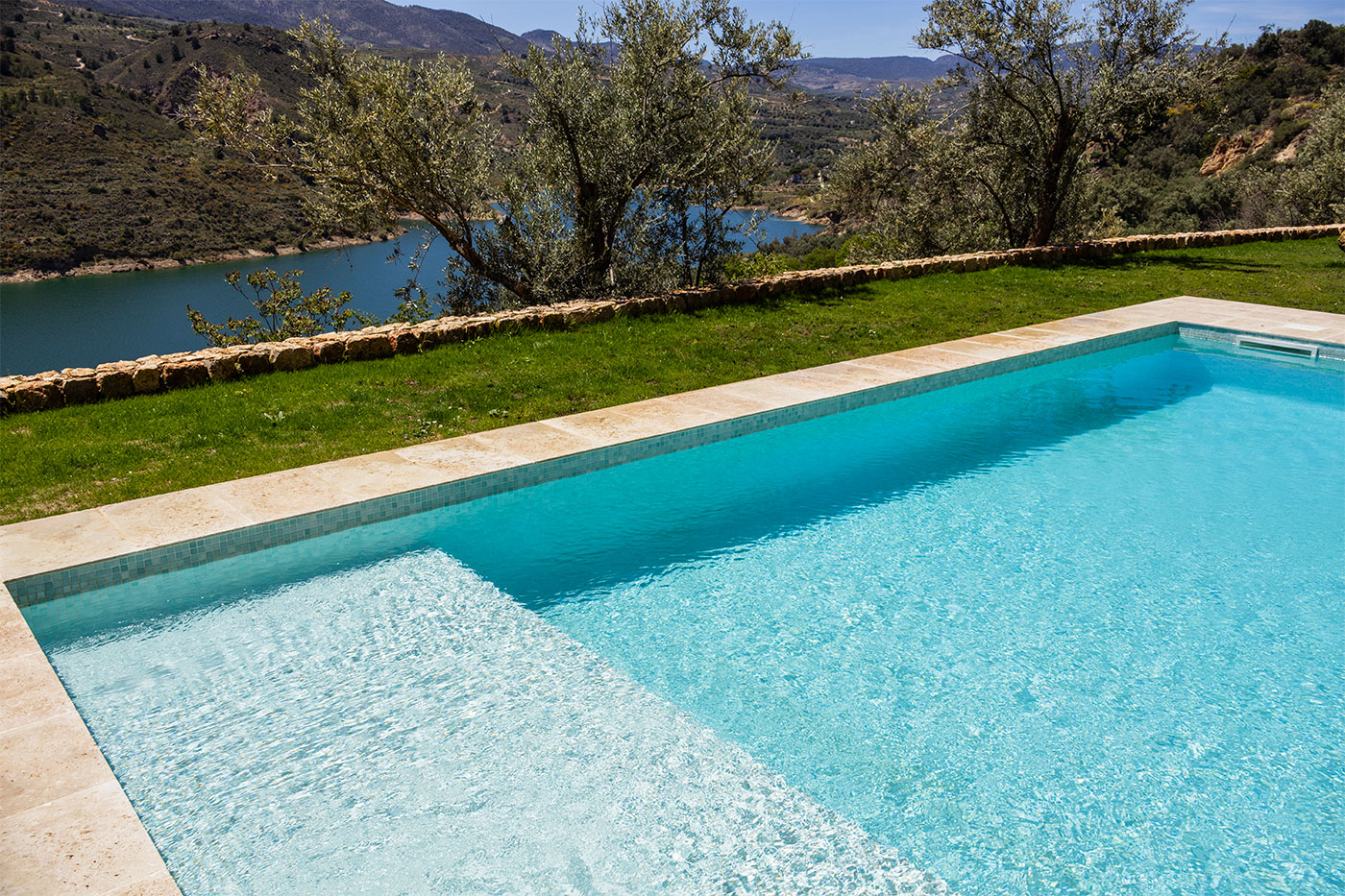 Pool with shallow end (beach zone)