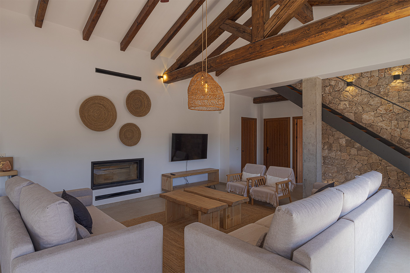 Living area with glass fronted fireplace