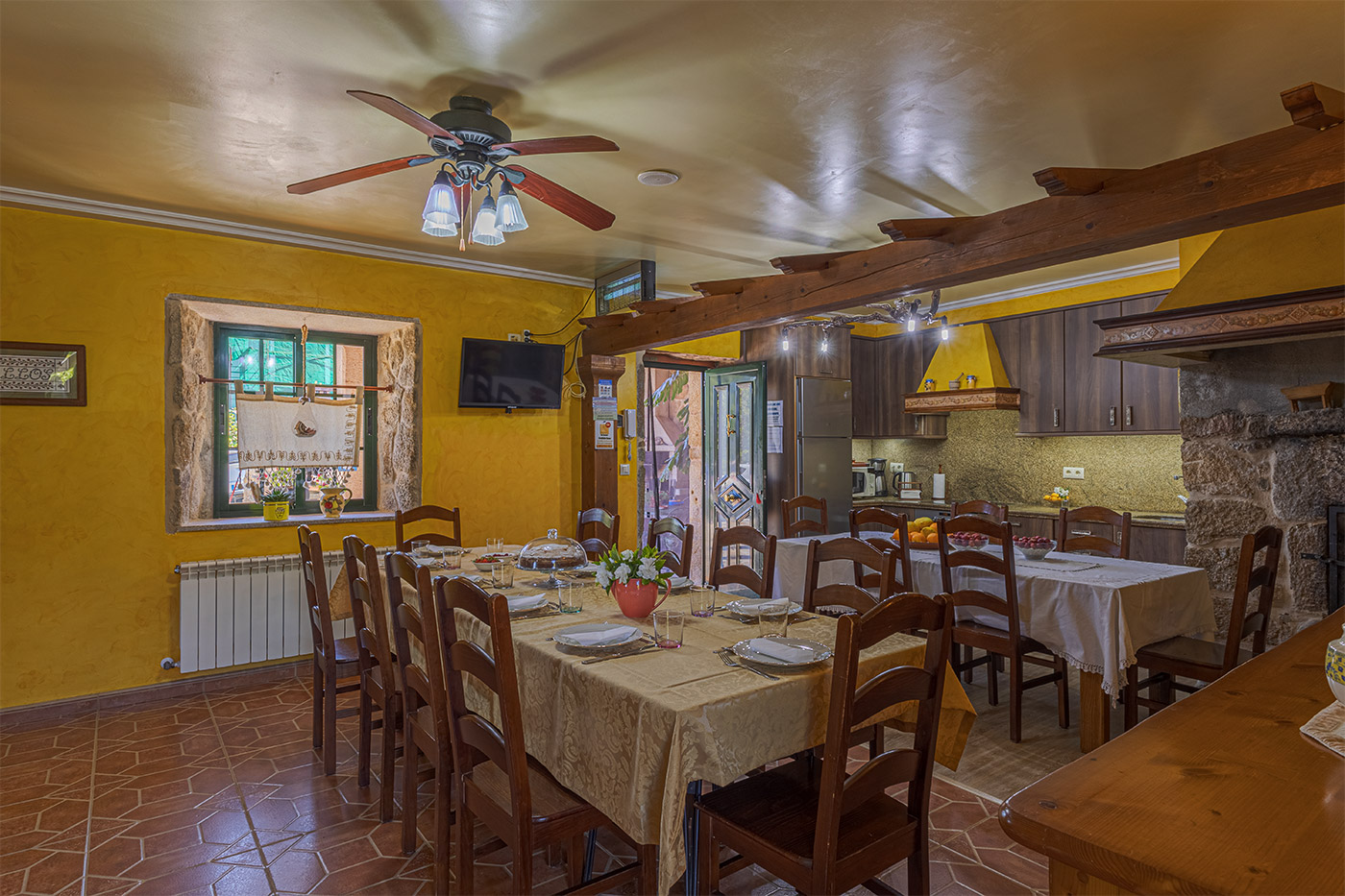 Large kitchen area with tables for groups