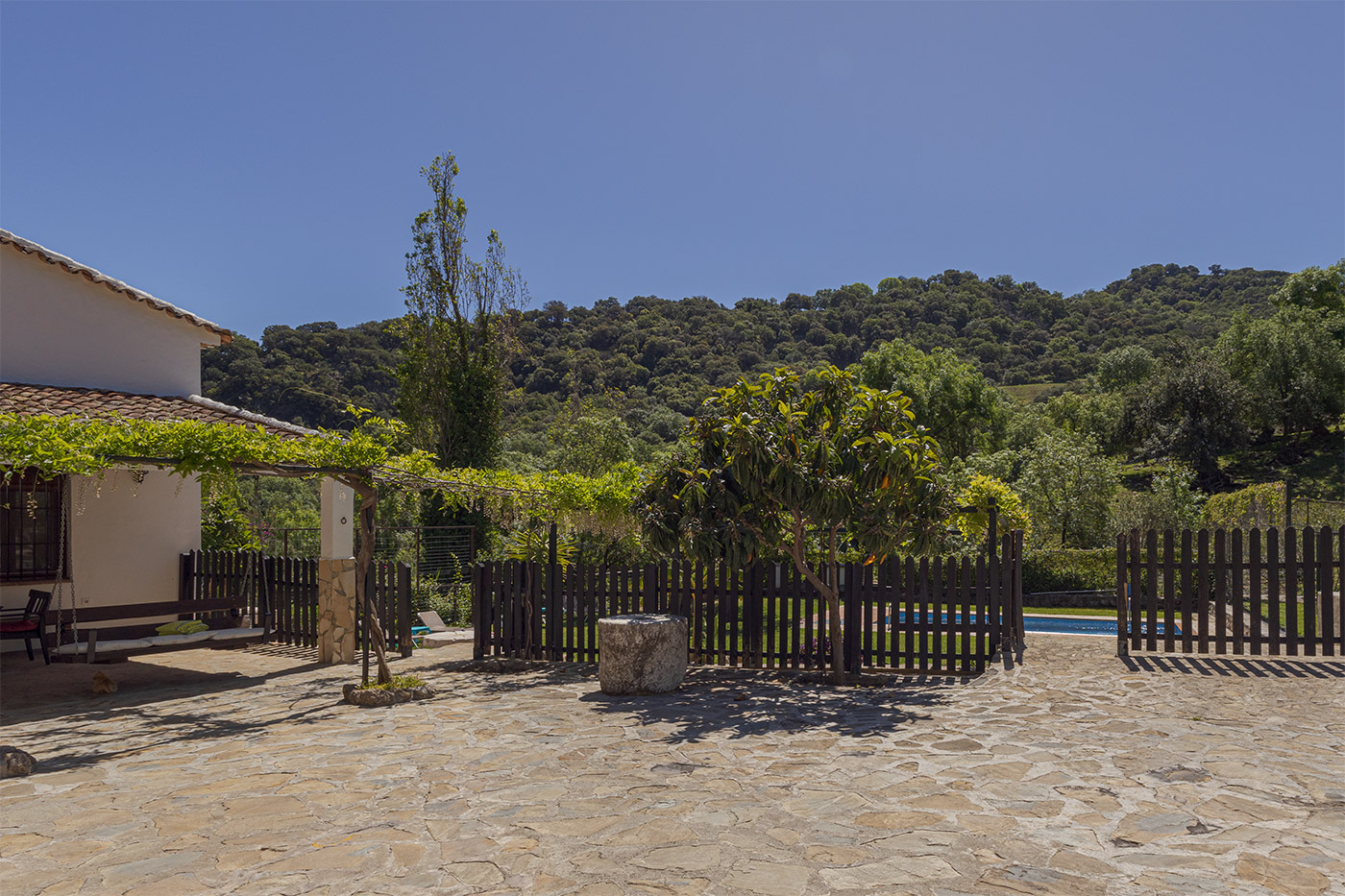 Large patio directly opposite the house