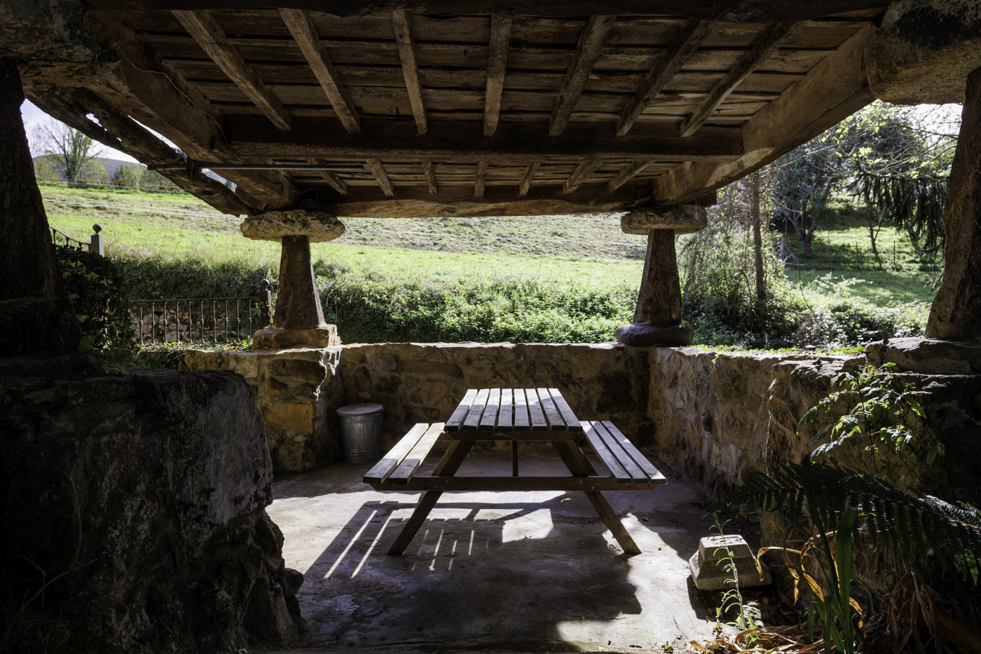 Picnic bench under traditional horreo