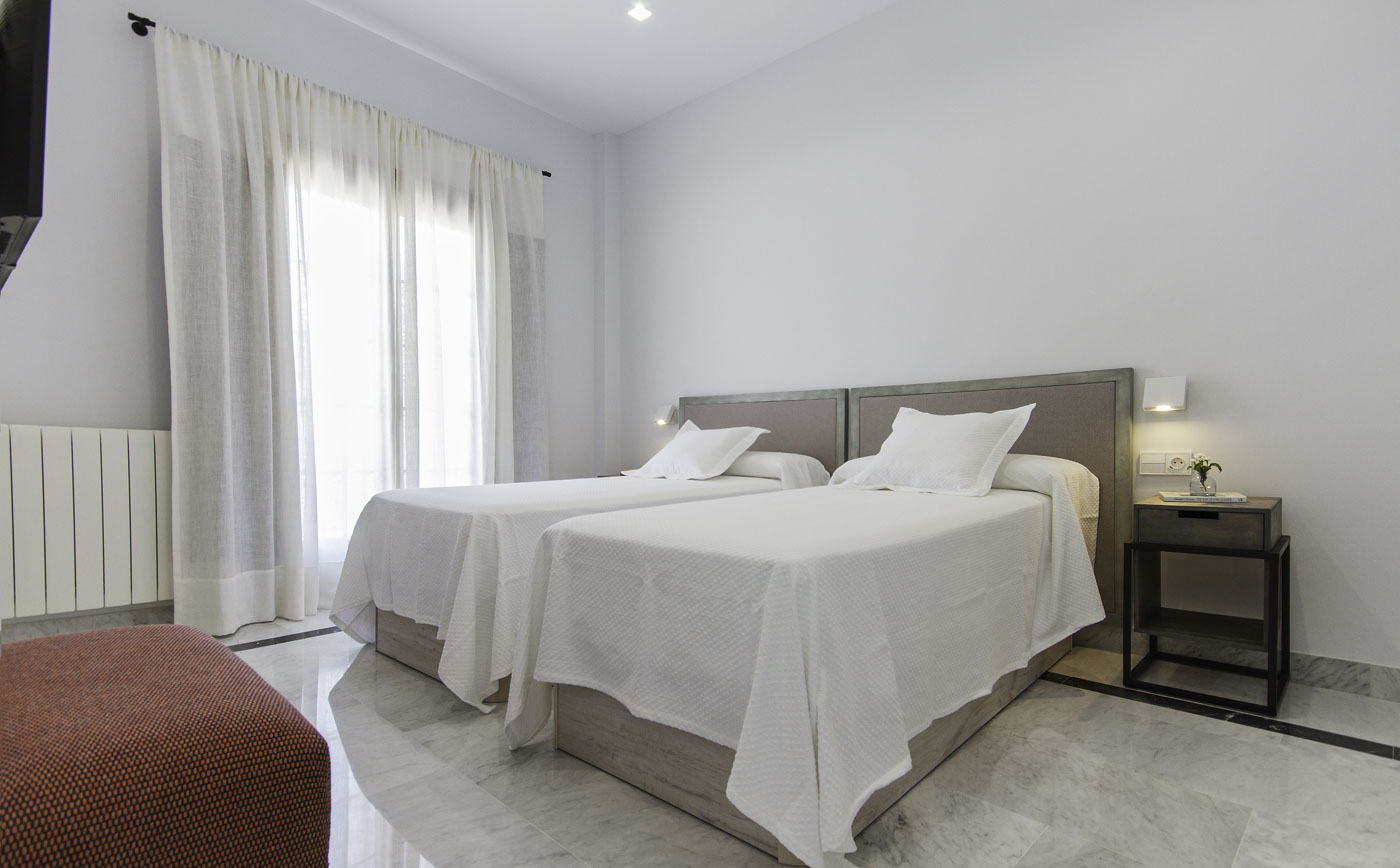 Habitación con camas indviduales