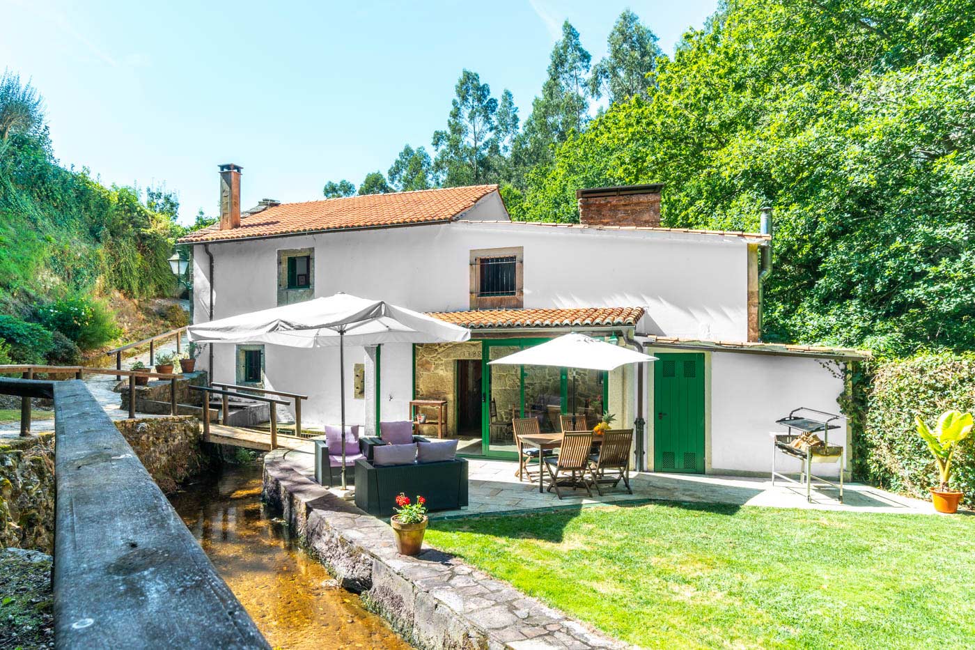 The restored mill still has a running stream