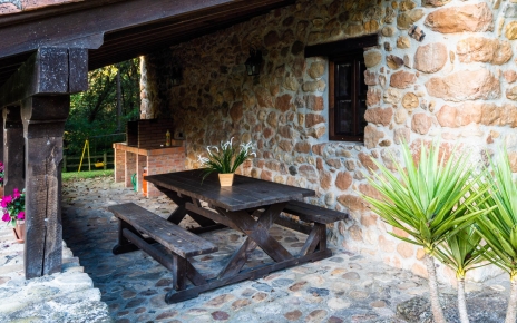 Picnic bench by barbecue area