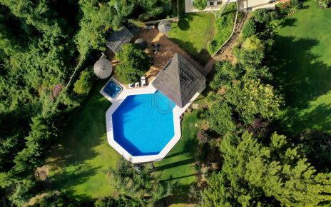 Pool and gardens seen from a drone