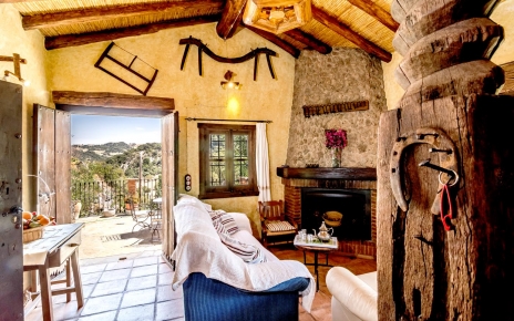 Cozy living area opens to terraces