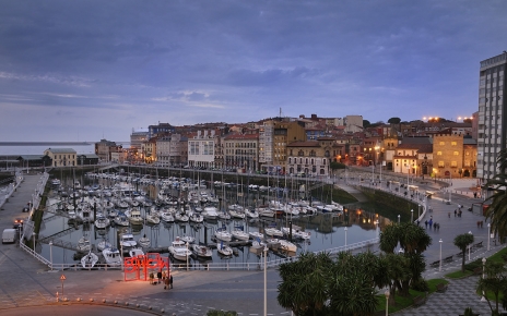 The coastal city of Gijon at night