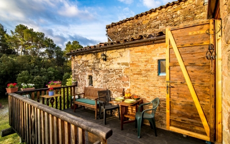 This furnished terrace is close to kitchen for outdoor meals