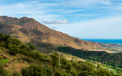 You are located between mountains and the sea