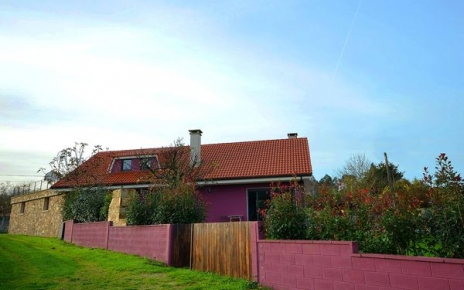Garden gates open directly to countryside