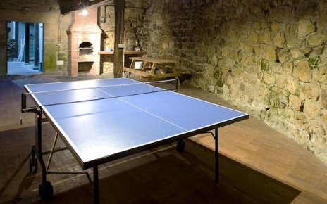 Games room with BBQ opens up to an external patio