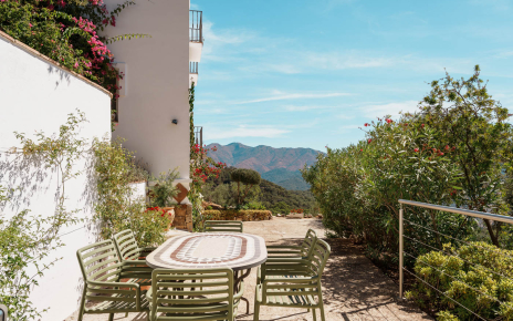 Terrace with barbecue below pool area