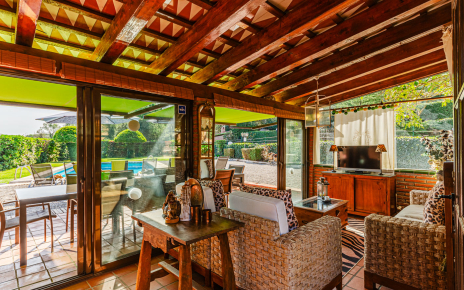 Indoor space blends with shaded terraces