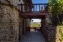 Lower patio and mid level access to gardens