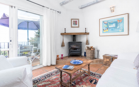 Dining area with doors opening to terrace