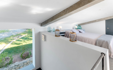 Master bedroom with large window