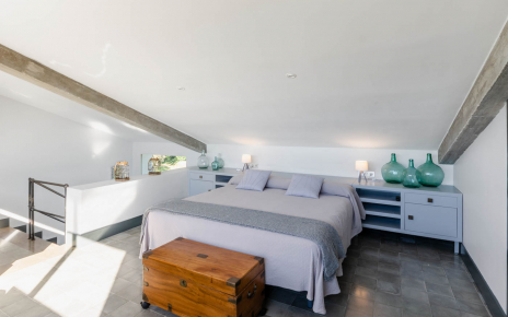 The master bedroom bed is king size