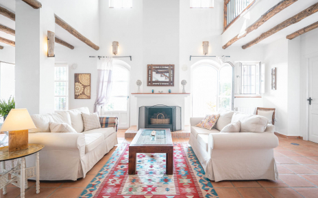 Living area with doors to furnished terraces
