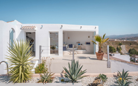 The kitchen / dining / living area seen from solarium