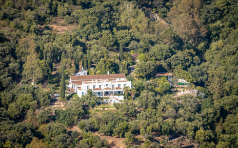 The villa with pool area on the right
