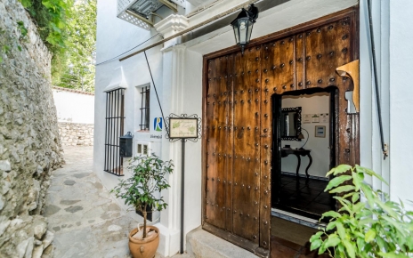 Back door opens to quiet village street