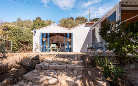 Covered barbecue area on the left