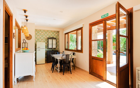 Kitchen/dining area with doors to furnished porch