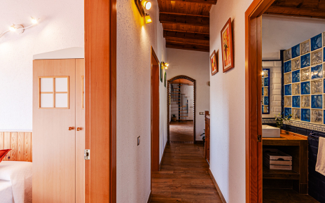 Hallway to bedrooms and shared bathroom
