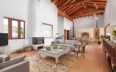 Open plan living / dining area with kitchen at far end