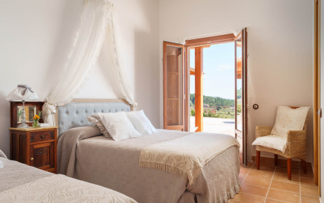 Bedroom 2, also with direct access to terraces