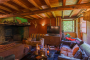 Living area with open fire and wood oven