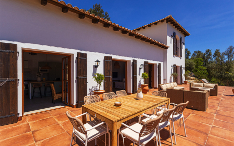 Open plan kitchen/dining/living opens to terrace