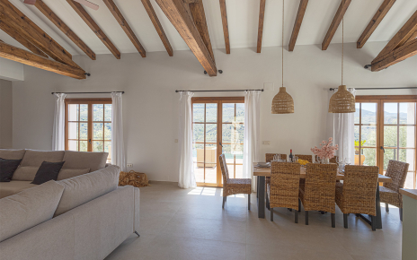 Large French windows opening to terraces