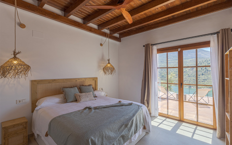 Ground floor bedroom with doors to terrace