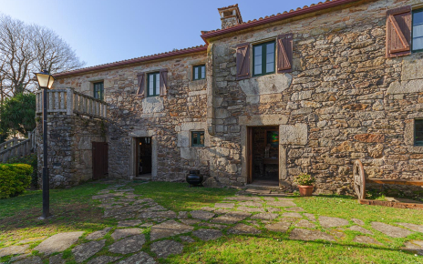 Two doors open from ground floor to gardens