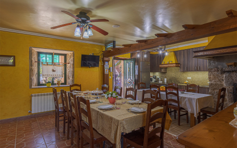 Large kitchen area with tables for groups