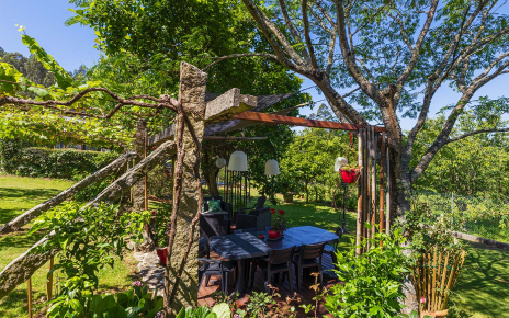 This furnished pergola is next to the swimming pool