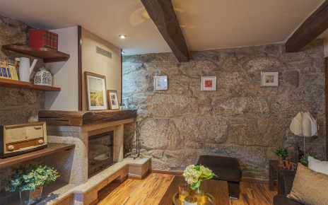 Living area with glass fronted fireplace