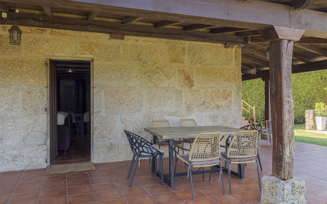 Living area opens to outdoor dining area