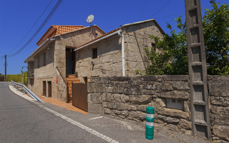 Part of your holiday home faces a country road 