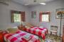 Habitación en planta baja (dos camas)